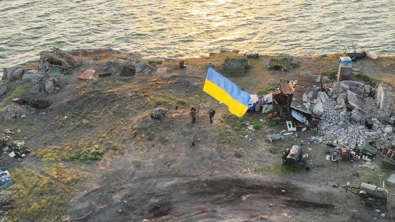 The Ukrainian flag flying over Snake Island after Russian forces were pushed out. Pic: Ukraine Ministry of Internal Affairs